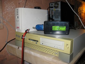 Microcontroller box with LCD, FrankenUPS, Tarquin (server, in the background), and Largo (old Sun box).